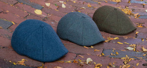 The Insulated Peakys are now here, available in Indigo Blue, Glacier Haze & Cedar Moss. Shown against a brick background.