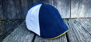 The Popeye cap is here featuring a black, white and blue patchwork