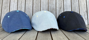 The Summer Peaky collection is here featuring The Rocket Pop, The Cookout and The Laserbeam caps shown against wood slats